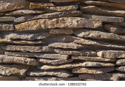 Brown stone wall  background  texture 
