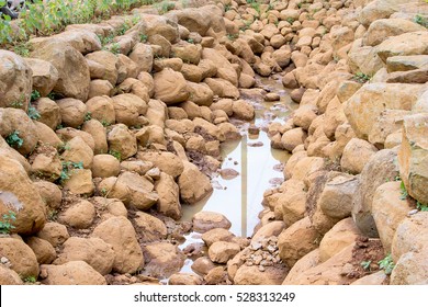 Brown Stone Wall On The Ground, The Water Shortage