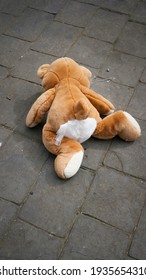 Brown Stuffed Monkey Toy On The Floor