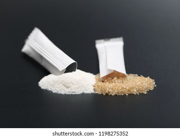 Brown Sugar And Creamer Packet Used In Coffee.