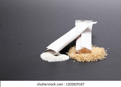 Brown Sugar And Creamer Packet Used In Coffee.