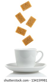 Brown Sugar Cubes With Coffee Cup