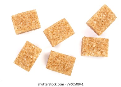 Brown Sugar Cubes Isolated On White Background. Top View. Flat Lay