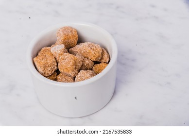 Brown Sugar Cubes In White Ramekin  