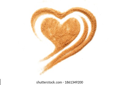 Brown sugar heart shaped scrub isolated on white background.