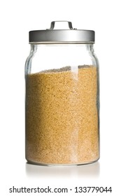 Brown Sugar In Jar On White Background