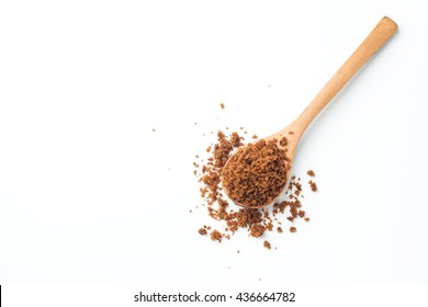 Brown Sugar With Wooden Spoon On White Background