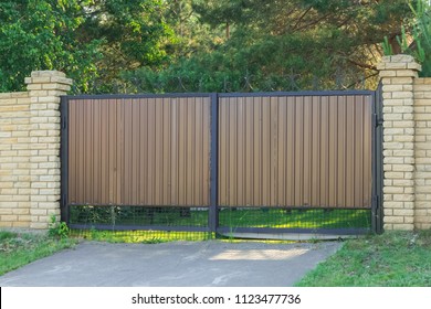 
Brown Swing Gates In The Village