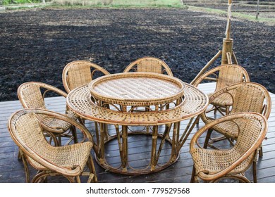 brown table set basketry made from rattan,on wooden floor