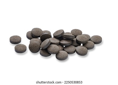 Brown tablets on white background. Herbal tablets, as a therapeutic and prophylactic for use in hepatitis, alcoholic liver disease and for prevention.  - Shutterstock ID 2250530853