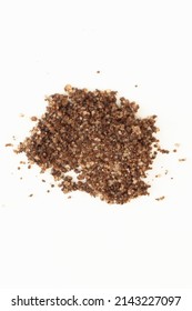 Brown Texture Scrub With Cocoa Coconut And Coffee On White Background. Spa And Home Care Concept, Beauty Procedures, Vertical Photo