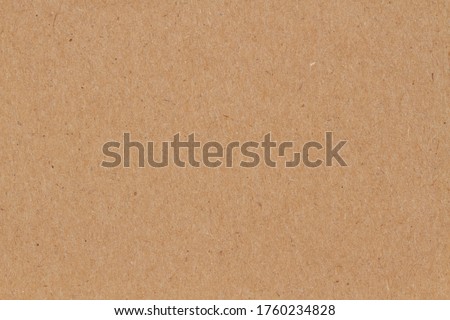 Brown textured cardstock paper closeup background with copy space for message or use as a texture 