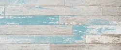 Brown, Turquoise, And Teal Wood Boards On A Wall. Vintage Wood Background With Colored Stain Or Paint. Old Horizontal Board Surface With Old World Feel.