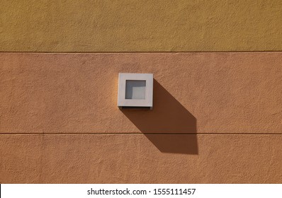 Brown wall with square box on the wall - minimal patterns  - Shutterstock ID 1555111457