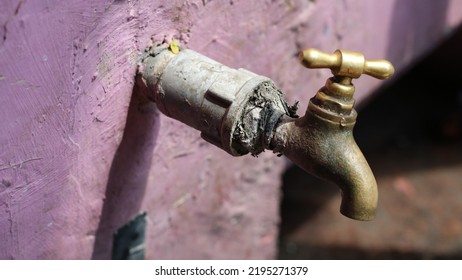 The Brown Water Faucet Is Old But Still Works