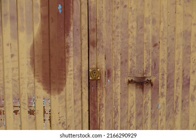 A Brown Weathered Metal Door