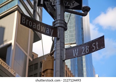 Brown West 28th Street And Broadway Historic Sign In Midtown Manhattan In New York City