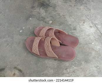 Brown Women's Sandals On The Cement Floor