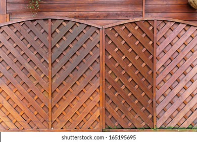 Brown Wood Fencing Panels In Garden