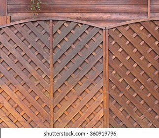 Brown Wood Fencing Panels In Garden