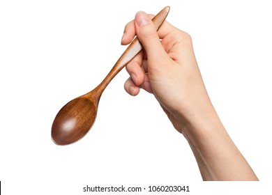 Brown Wood Spoon In Hand Isolated On White Background.