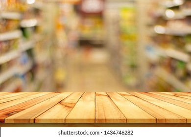 Brown wood table and shelf, blurred background
