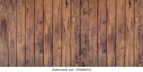 Brown wood texture background coming from natural tree. The wooden panel has a beautiful dark pattern, hardwood floor texture - Shutterstock ID 1933065911