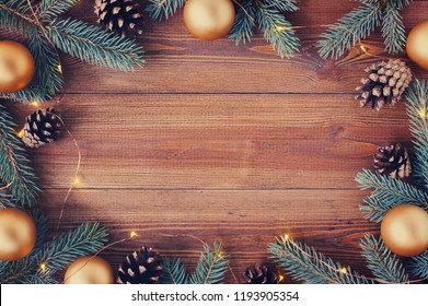 Brown wooden background with festive Christmas decoration, copy space - Powered by Shutterstock