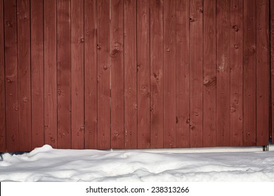 Brown Wooden Fence In Snow