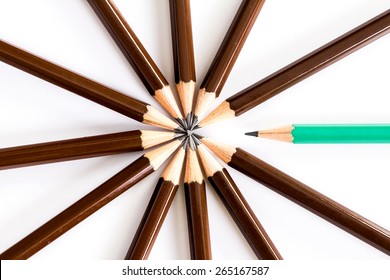 brown wooden pencil arrange as circular with one of different pencil try to close the gap on white background , un matching and competition concept