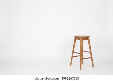 brown wooden stool on clean white background. Taken in photo studio - Shutterstock ID 1981267265