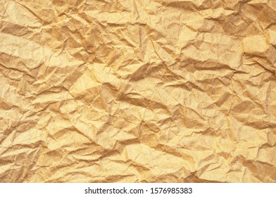Brown yellow crumpled paper texture background - Shutterstock ID 1576985383
