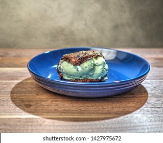 Brownie And Mint Chocolate Chip Ice Cream Sandwich.