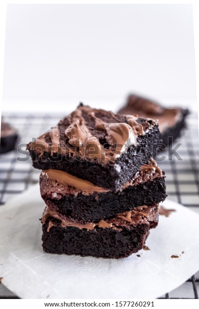 Brownies Milk Chocolate Melted Frosting Stock Photo (Edit Now) 1577260291