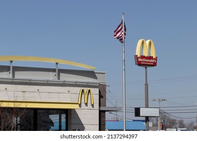 Brownsburg - Circa March 2022: McDonald's Restaurant. McDonald's Is Offering Employees Higher Hourly Wages, Paid Time Off, Backup Child Care And Tuition Payments.