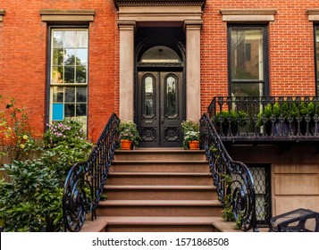 Brownstone facades & row houses at sunset in an iconic neighborhood of Brooklyn Heights in New York City - Shutterstock ID 1571868508