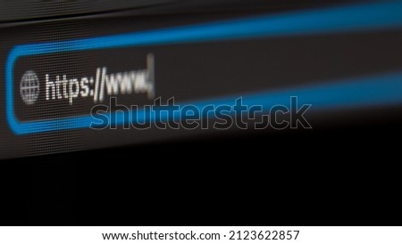 Browser close-up with https  blue frame, black background  LCD screen
