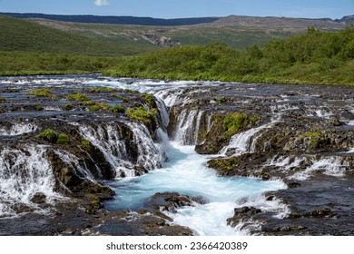 Bruarfoss Waterfall, the teal water along the Golden Circle of Iceland