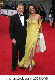 Bruce Forsyth And Wilnelia Merced Arriving For The TV BAFTA Awards 2013, Royal Festival Hall, London. 12/05/2013