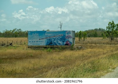 Bruce Highway Townsville To Mackay, Queensland, Australia - November 2021: Outdoor Advertising Billboard For A Caravan Park On The Beach