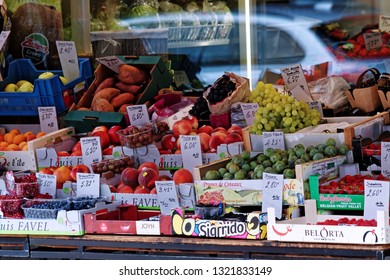 Bruges, Belgium - August 13, 2018: Street Market. Fresh Fruit On Display At A Vendor's Stall.