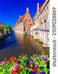 Bruges, Belgium: The Hospital of St. John or Oud Sint-Janshospitaal, a medieval hospital in Bruges, along Dijver Canal at Mariabrug, West Flanders