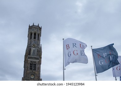 Bruges - Belgium - March 28, 2021: The Belfry of Bruges is a high medieval tower surmounting the Cloth Hall on the Grote Markt in the city of Bruges, in the province of West Flanders in Belgium. 