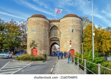 Bruges, Belgium - November 12, 2021:  - The Gentpoort or Ghent Gate, a 15th Century part of the citys defences. 