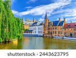 Bruges cityscape, De groote Hollander Huidevettershuis and restaurant in Brugge old town historical city centre, Rosary Quay, Dijver water canal of Reie river, Flemish Region, Belgium