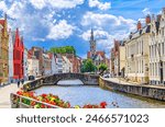 Bruges cityscape, Spiegelrei water canal, Poortersloge tower, King