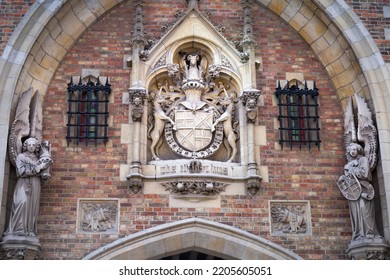 Bruges Gothic Cathedral Architecture With Angels And Coat Of Arms, Belgium