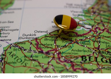 Bruges pinned on a map with the flag of Belgium