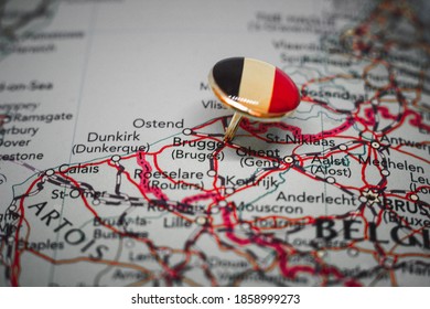 Bruges pinned on a map with the flag of Belgium