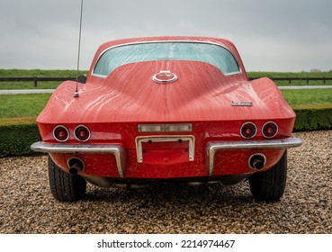 Brummen, Province Gelderland, The Netherlands, 15.10.2022, Rear View Of Legendary Chevrolet Corvette Sting Ray From The 1960s, Second Generation In Red Color